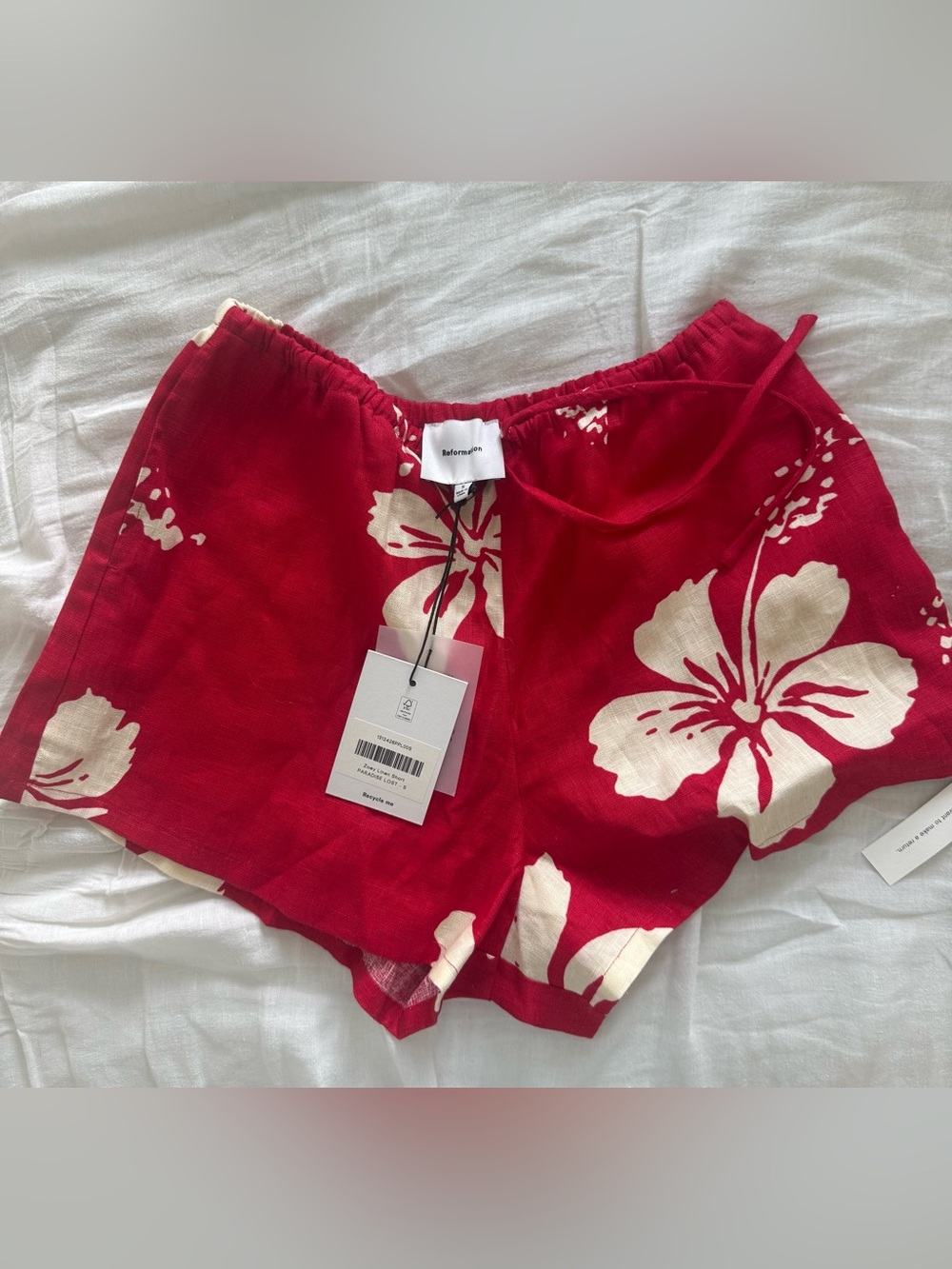 Reformation Red Linen Shorts with Cream Hibiscus Print